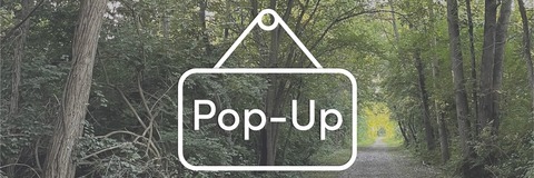 Wooded pathway with transparent Pop-Up sign overlay